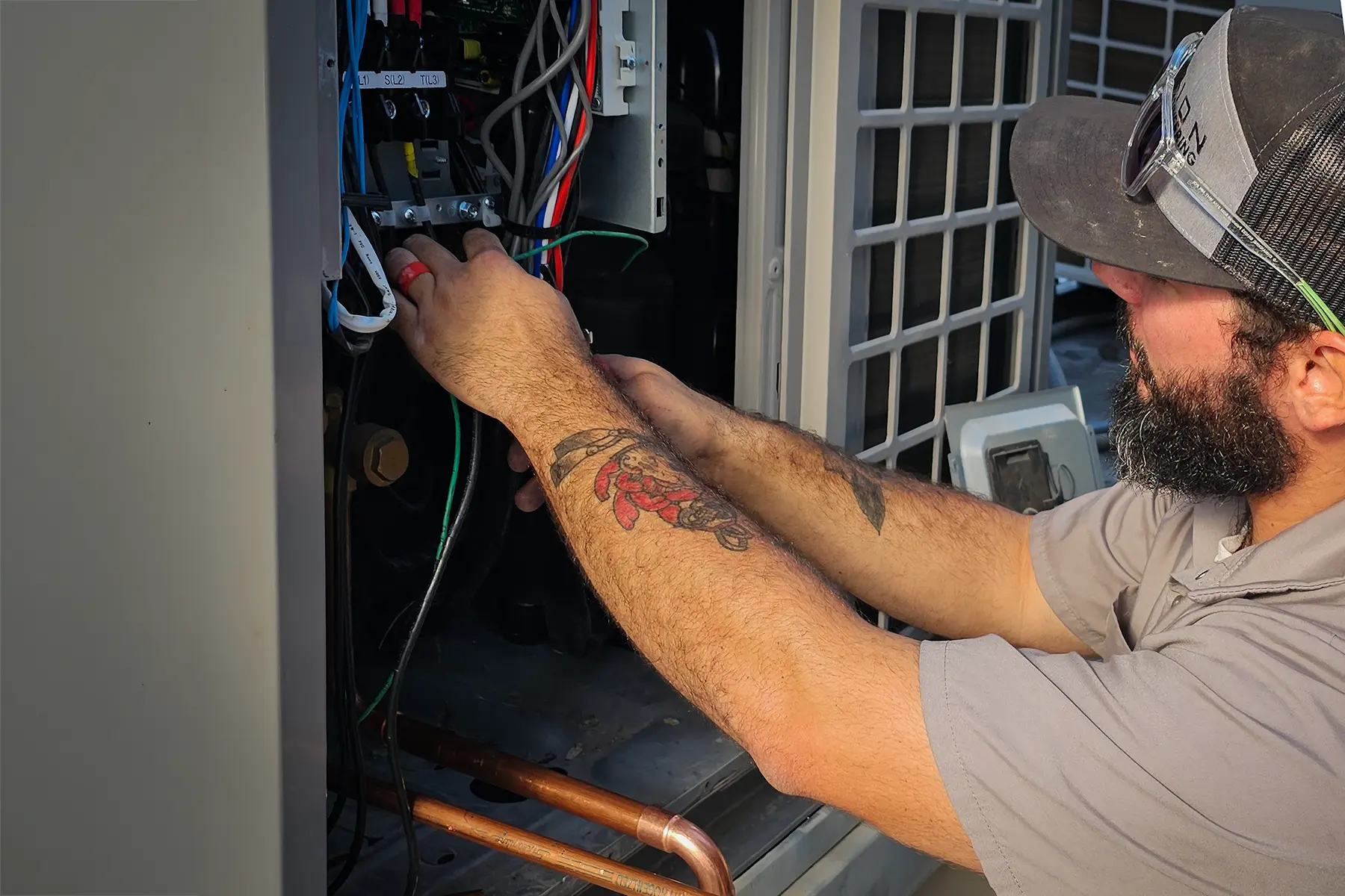 Outdoor commercial VRF condenser bank reviewed for maintenance requirements and replacement planning.